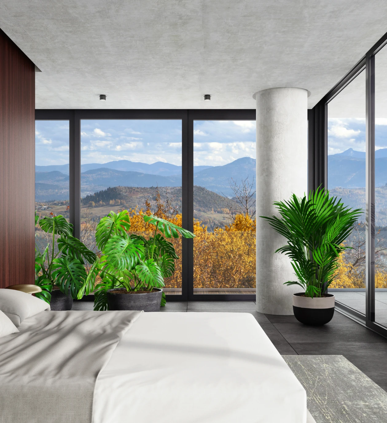 Bedroom with large windows and plants