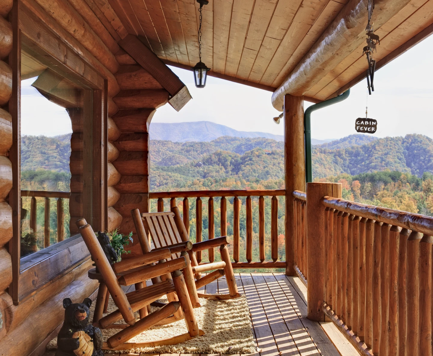 Wooden rocking chairs on cabin deck